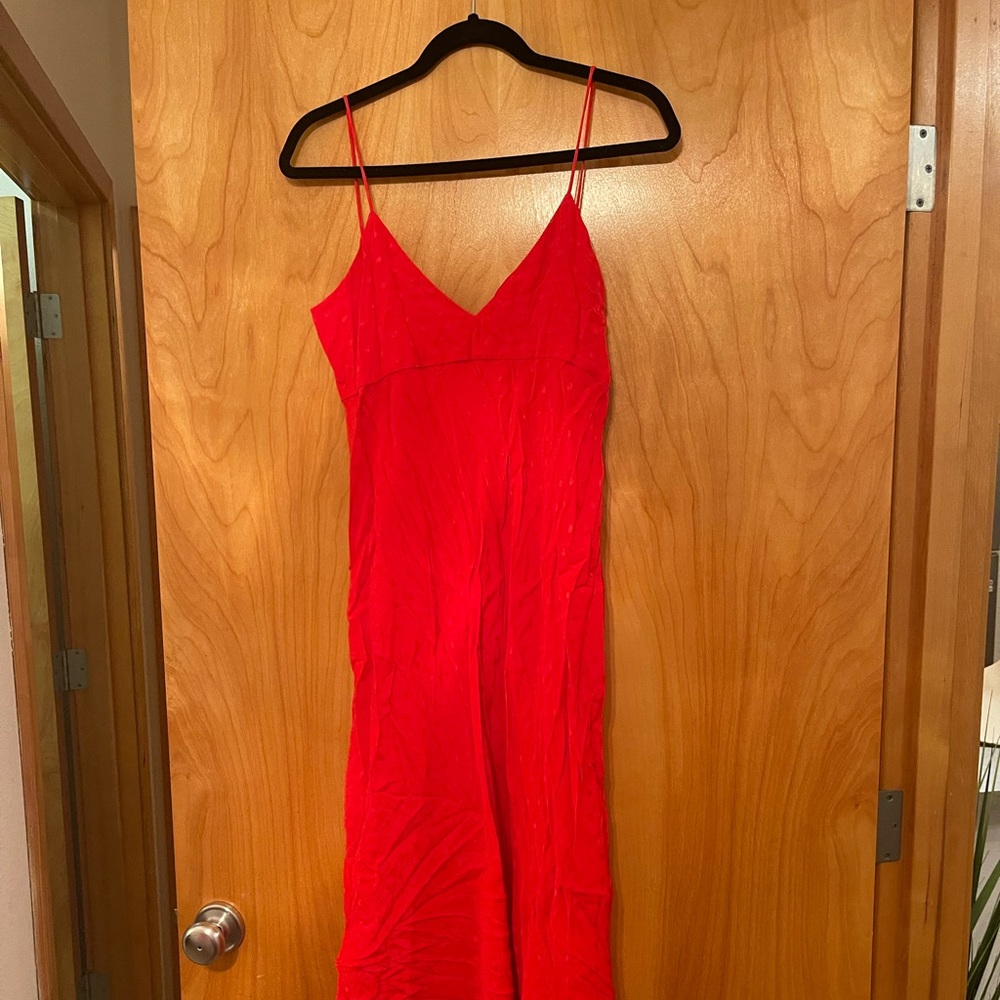 Spaghetti strap midi dress with ruffle slit